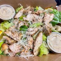 Caesar Salad · Romaine lettuce tossed with Caesar dressing, home made organic croutons, Parmesan cheese and...