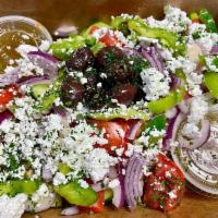 Mediterranean Salad · Tomatoes, cucumbers, green peppers, onions, Kalamata olives and Feta cheese, served with our...