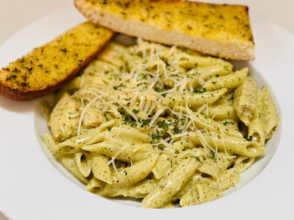 Penne Chicken Pesto · Penne noodles and sautéed chicken with creamy Pesto sauce , topped with Parmesan cheese and fresh Italian parsley.