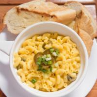 Mac & Cheese · Cheddar bechamel sauce, elbow macaroni,  jalapeños, and side fresh bread.