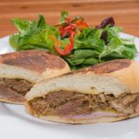 Cuban Sandwich · Popular. House made pulled pork, honey ham, our own mustard, dill pickle, and Swiss cheese o...