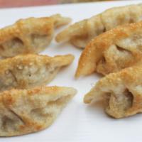 Pork Dumplings · Homemade pork filled dumplings (pan-fried or steamed).