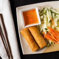 Vietnamese Egg Rolls · Filled with pork, carrots, ear mushroom, rice noodle, deep fried and served with fish sauce.