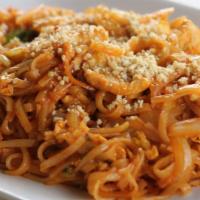 Phad Thai · Spicy dish. Popular thai-style rice noodle dish with egg, scallions, onions, bean sprouts, c...