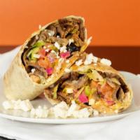 Chicken Gyro Wrap · Thinly sliced slow roasted chicken gyro meat, red onions, pickles, lettuce, feta cheese, cub...