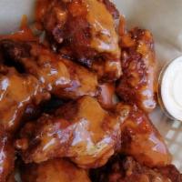 Ultimate Wings · 6 wings with your choice of house BBQ sauce.