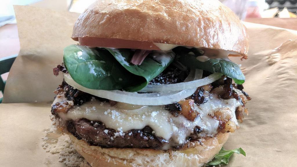 Hamburger · Grilled and served with lettuce, pickles, tomatoes and onions. Choice of 100% Angus beef, grilled chicken or a housemade vegetarian black bean patty.