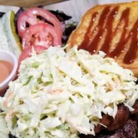 Slaw Burger · House slaw, bacon and house BBQ. Choice of 100% Angus beef, grilled chicken or a housemade v...