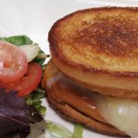 Ultimate Grilled Cheese · Cheddar, Pepper Jack, Monterrey jack, Provolone