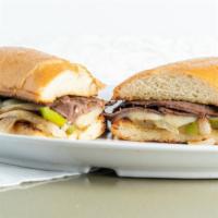 Philly Cheesesteak · Roast beef, 2 slices of provolone cheese, sautéed onion, and green bell pepper.