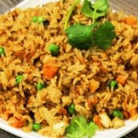 Spicy Guru Fried Rice · Spicy. Our favorite Indian curry rice white rice, vegan ham, crispy protein bits, tofu, peas...