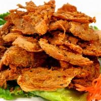 Golden Beauty · Spicy. Crispy chick less protein, lemon- grass, spicy seasonings and placed on a bed of chop...