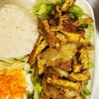 Radiant Rice Plate With Curry Tofu · Spicy. Large plate of white or brown rice, cucumbers, lettuce, pickled carrots and daikon an...