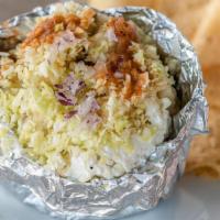 Vegetarian Potato · Baked potato topped with butter, sour cream, monterey jack cheese, diced cabbage, diced red ...