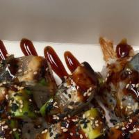 Dragon Roll · Crab salad, shrimp, eel,avocado, eel sauce, masago.