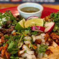 House Taco'S · Three homemade tortillas filled with your choice of meat and topped with onions, cilantro, a...