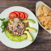 Agua Chile'S · Prawns tossed in a spicy lime citrus sauce with avocado, cucumber's, onions.