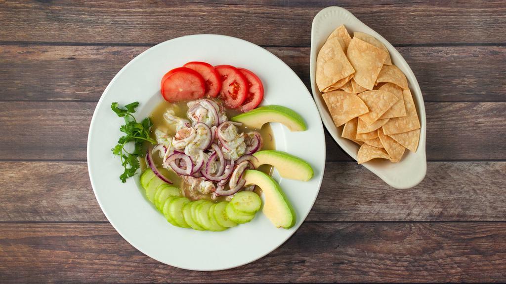 Agua Chile'S · Prawns tossed in a spicy lime citrus sauce with avocado, cucumber's, onions.
