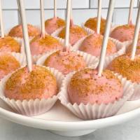 Strawberry Shortcake Cake Pop · Vanilla cake pop dipped in strawberry chocolate and garnished with crushed graham cracker. C...