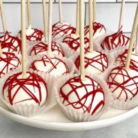 Red Velvet Cake Pop  · Red velvet cake pop infused with cream cheese and dipped in white chocolate. Sprinkles/style...