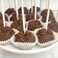 Chocolate Cake Pop · Chocolate cake pop dipped in milk chocolate and garnished with sprinkles. Sprinkles may vary...