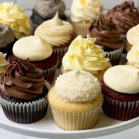 Assorted Cupcakes (6) · Assorted daily selection of cupcakes. Customization not available. Regular size.