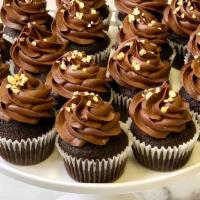 Nutella Cupcake · Our signature chocolate cupcake topped with Nutella infused chocolate buttercream topped wit...