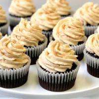 Chocolate Salted Caramel Cupcakes · Chocolate cupcakes with salted caramel buttercream and caramel drizzle. Customization not av...