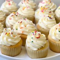 Vanilla Cupcakes · Vanilla cupcakes with vanilla buttercream and rainbow sprinkles. Sprinkles may vary. Customi...