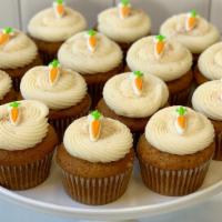 Carrot Cupcake · Delicious and moist cinnamon spice cake packed with fresh carrots, walnuts, currants and gol...
