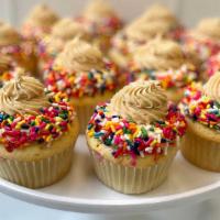 Funfetti Cupcake · Our scratch made vanilla confetti cake topped with delicious cookie butter buttercream and a...