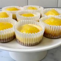Lemon Mini Cheesecake · A petite sweet, our mini cheesecakes are made in house and fit in the palm of your hand. Cla...