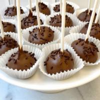 Gf Double Chocolate Cake Pop · Our GF chocolate cake dipped in chocolate and garnished with chocolate sprinkles.