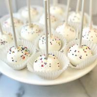Gf Vanilla Cake Pop · Our GF vanilla cake dipped in vanilla chocolate and garnished with rainbow sprinkles.