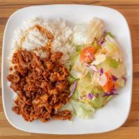 Spicy Pork Plate · thin sliced pork marinated in a spicy-soy garlic sauce with steamed rice and a side salad