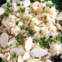 Cauliflower Rice · Cauliflower w/ capers, golden raisins, & almonds | Vegan. Gluten-free.. **Allergens: tree nuts