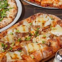 Sausage And Stout Pizza · Serves for two. Honey malted dough made with stout beer, fresh mozzarella, beer sausage, car...