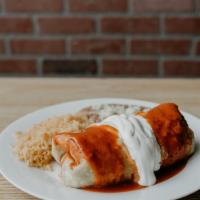 Burrito Plate · Burrito made with your choice of meat topped with enchilada sauce, sour cream, and cheese, s...