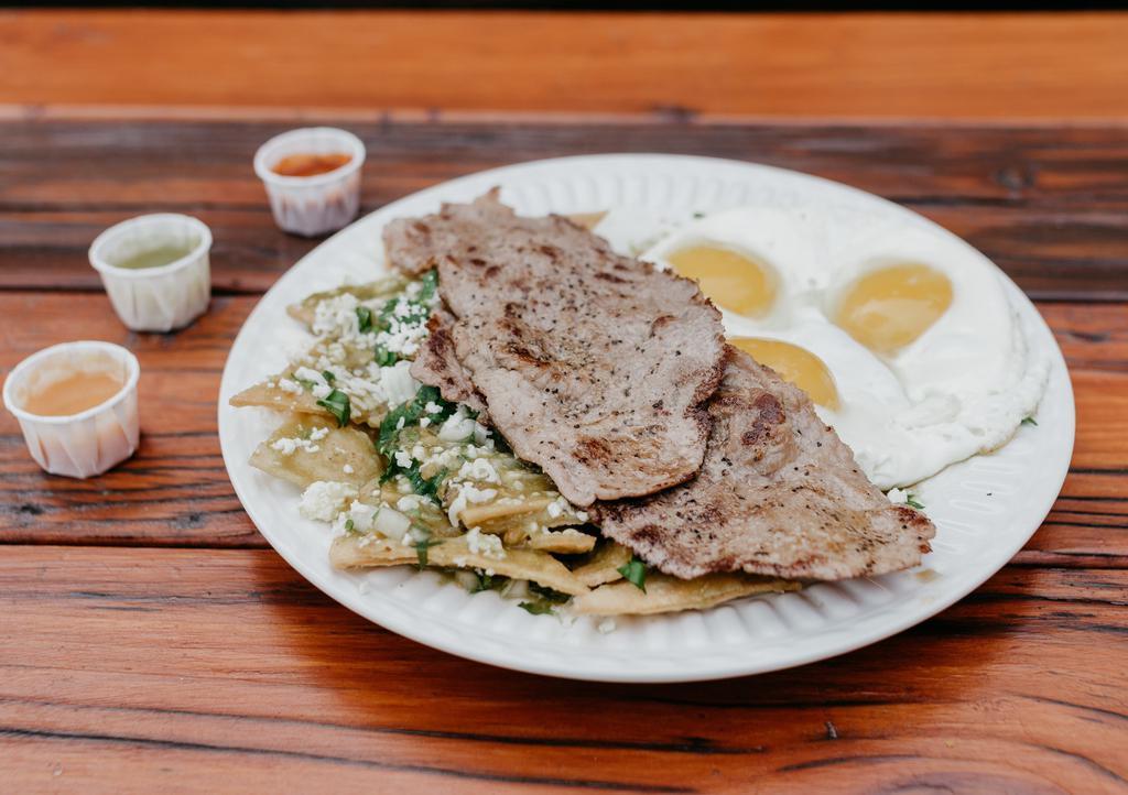 Chilaquiles With Eggs And Meat · Tortilla chips  in green salsa, with a choice of meat, topped with onions, cilantro and queso fresco served with 3 eggs. Extra toppings for an additional charge.