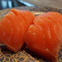 Salmon/Tuna Sashimi · Comes with 6 pieces  of salmon and 6 pieces tuna.