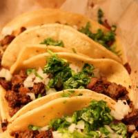 Street Taco · (choice of meat) onions & cilantro
