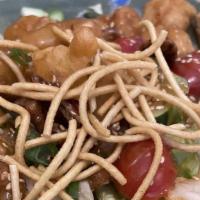 Oriental Chicken Salad · Fried white meat chicken, mixed greens, crunchy noodles and pecans with sesame ginger dressi...