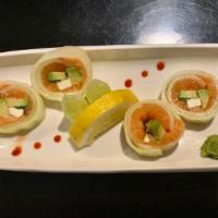 Philly Roll With Cucumber · Fresh Salmon Cream Cheese and Avocado wrapped in Cucumber 
this roll has no rice