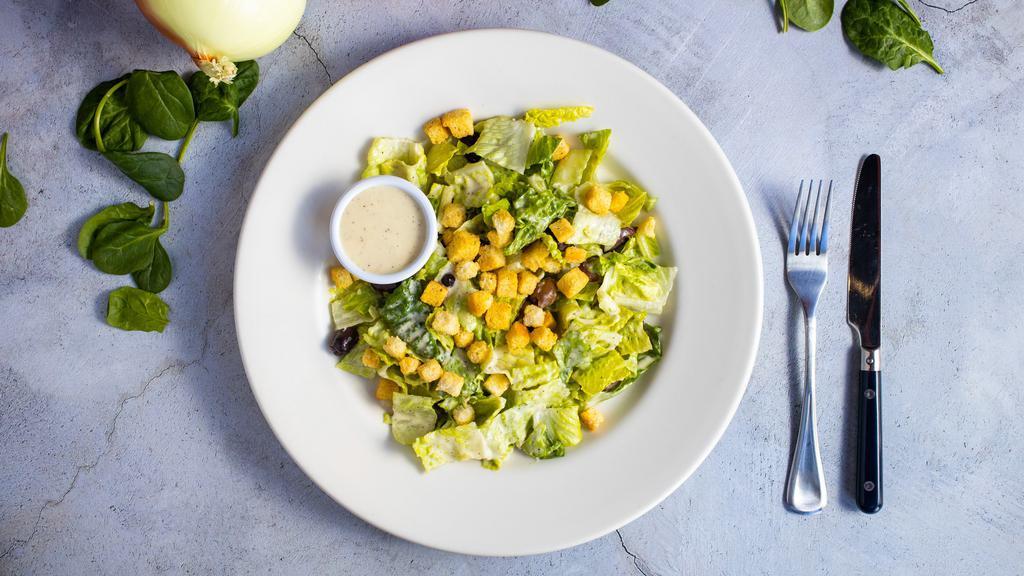 Caesar Is Dead, Lettuce Pray  · Romaine, olives, croutons, Parmesan cheese, and caesar dressing.
