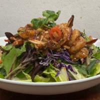 Sexy Shrimp Salad · Grilled shrimp tossed with spicy chili sauce and green salad.