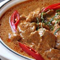 Panang Tender Beef · Diced beef in panang coconut curry sauce.