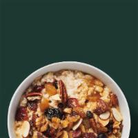Oatmeal · Premium oatmeal featuring dried fruit, brown sugar and nut toppings.