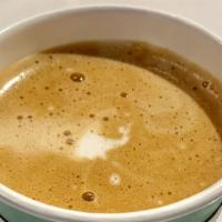 Latte · Steamed milk and espresso.