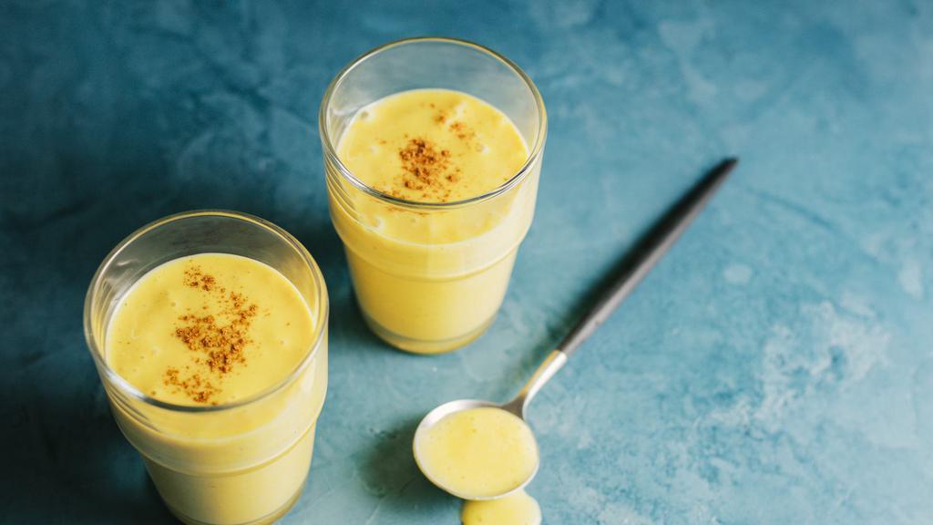 Haldi Lassi (Non-Dairy) · The healing powers of turmeric in lassi form. Oat milk, non-dairy yogurt, turmeric, honey,  saffron, cinnamon and nutmeg.