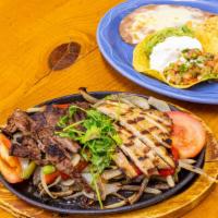 Fajitas · Traditional meets contemporary with our sizzling skillets. Grilled, marinated steak, chicken...